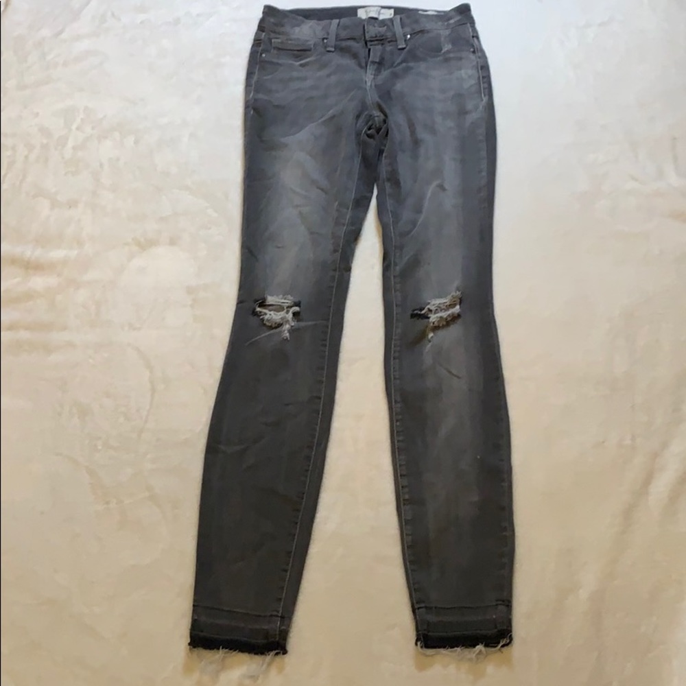 Jessica’s  light wash grey distressed jeans